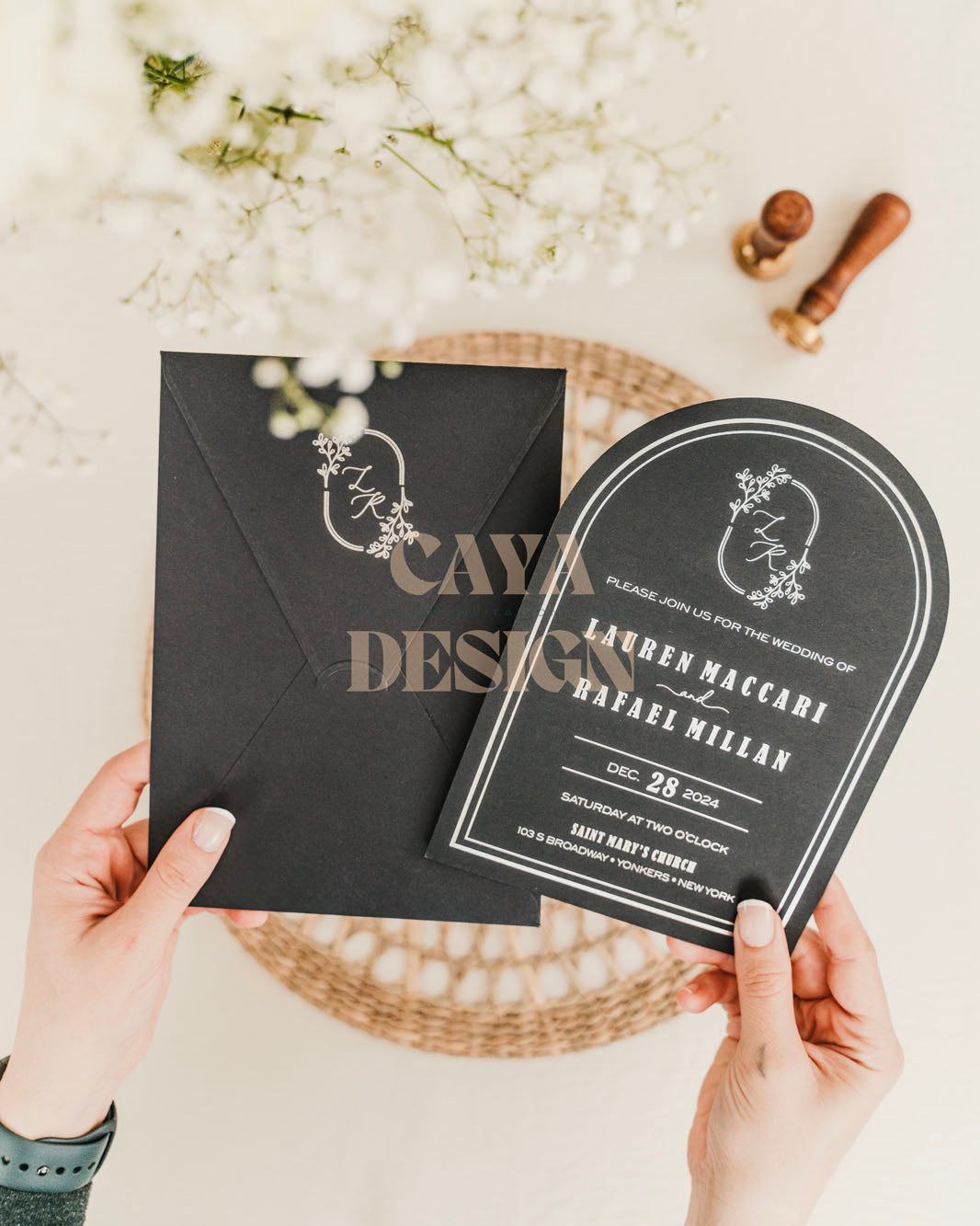 Black Paper Vertical Wedding Invitation with Paper Insert Card and Silver Foil Front View in hands