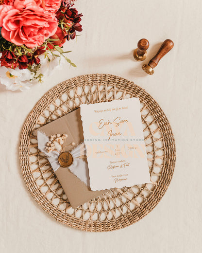 Brown Paper Half Fold Wedding Invitation with Paper Insert Card and Gold Foil and wax seal at a wedding