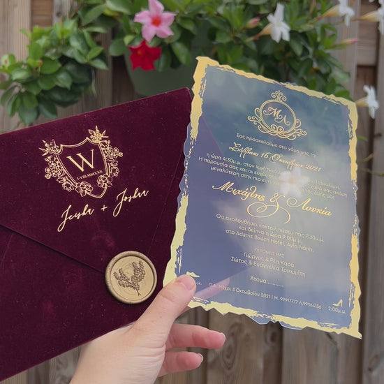 Video of a Burgundy Velvet Horizontal  Wedding Invitation with Acrylic Insert Card, Gold Foil details and wax seal