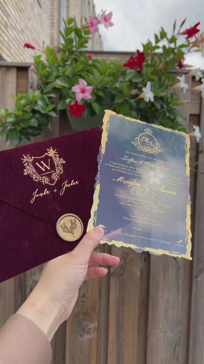 Video of a Burgundy Velvet Horizontal  Wedding Invitation with Acrylic Insert Card, Gold Foil details and wax seal