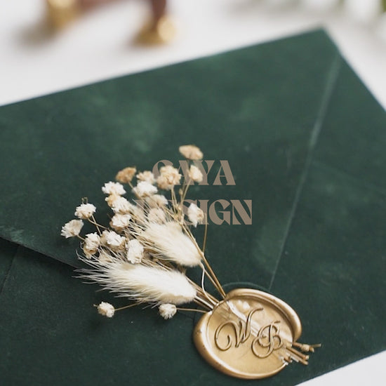 Video of a Emerald Green Velvet Horizontal  Wedding Invitation with Acrylic Insert Card, Gold Foil details, wax seal and flowers