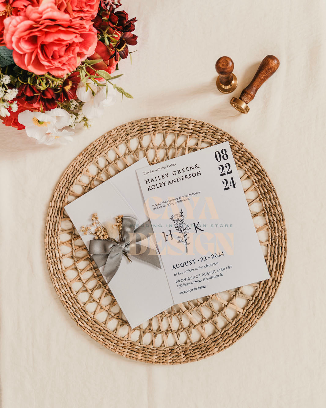 White Paper Half Fold Wedding Invitation with Paper Insert Card and Silver Foil with Ribbon at a wedding